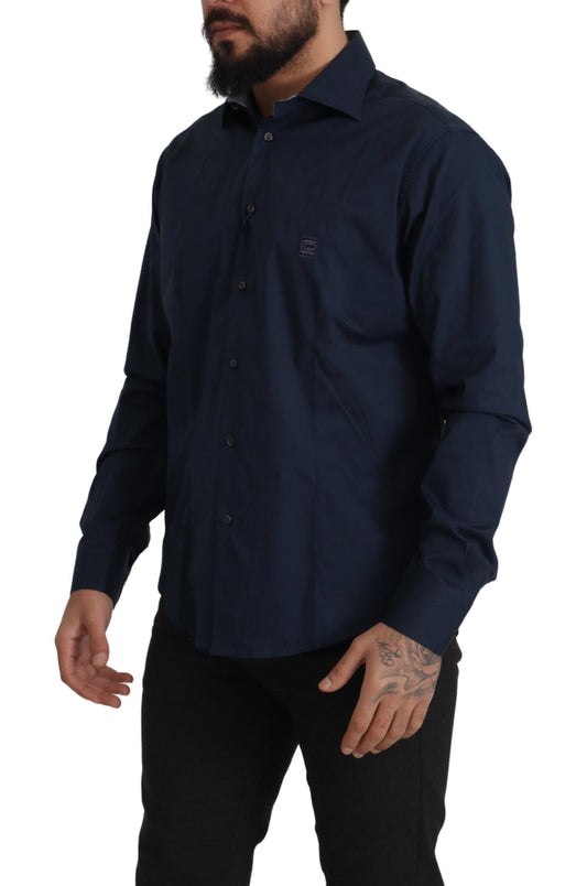 A navy blue dress shirt with a collar, long sleeves and buttons down the front
