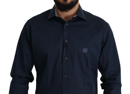 A navy blue dress shirt with a logo on the left chest area