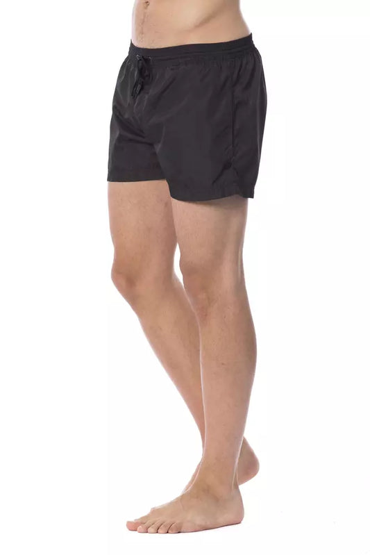 Black swim trunks on a man's body