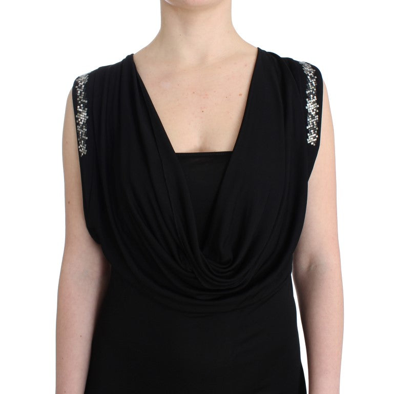Black sleeveless dress with embellishments on neckline