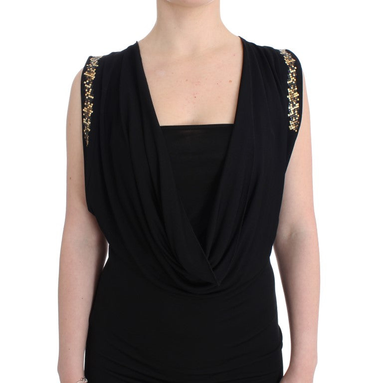 Black sleeveless top with gold sequins on shoulders