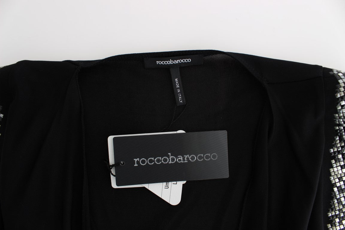 Black dresses on hangers with tags