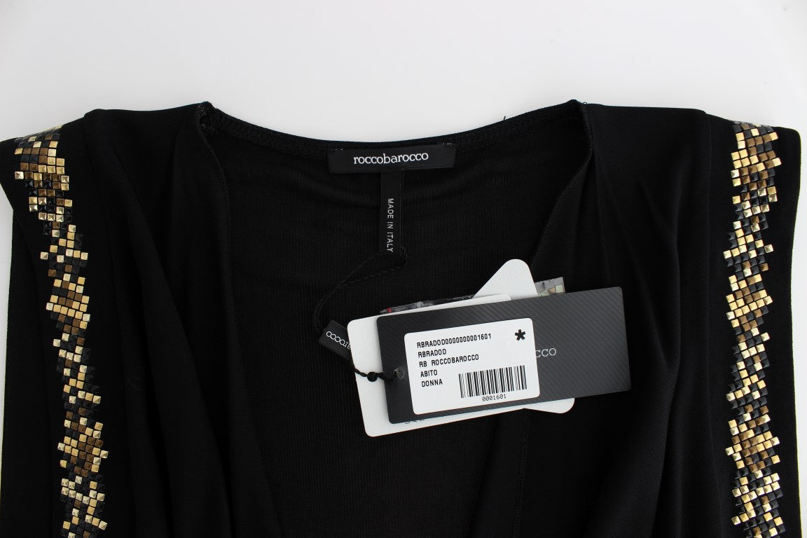 Black shirt with gold sequins on sleeves
