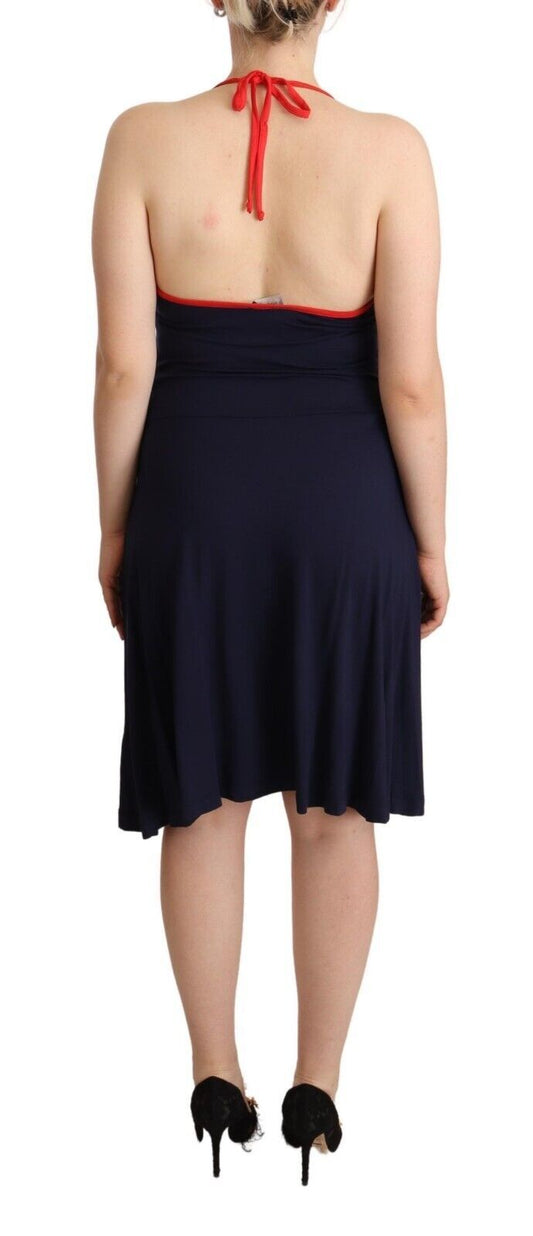 A navy blue sleeveless halter sheath midi dress with a red ribbon at the back