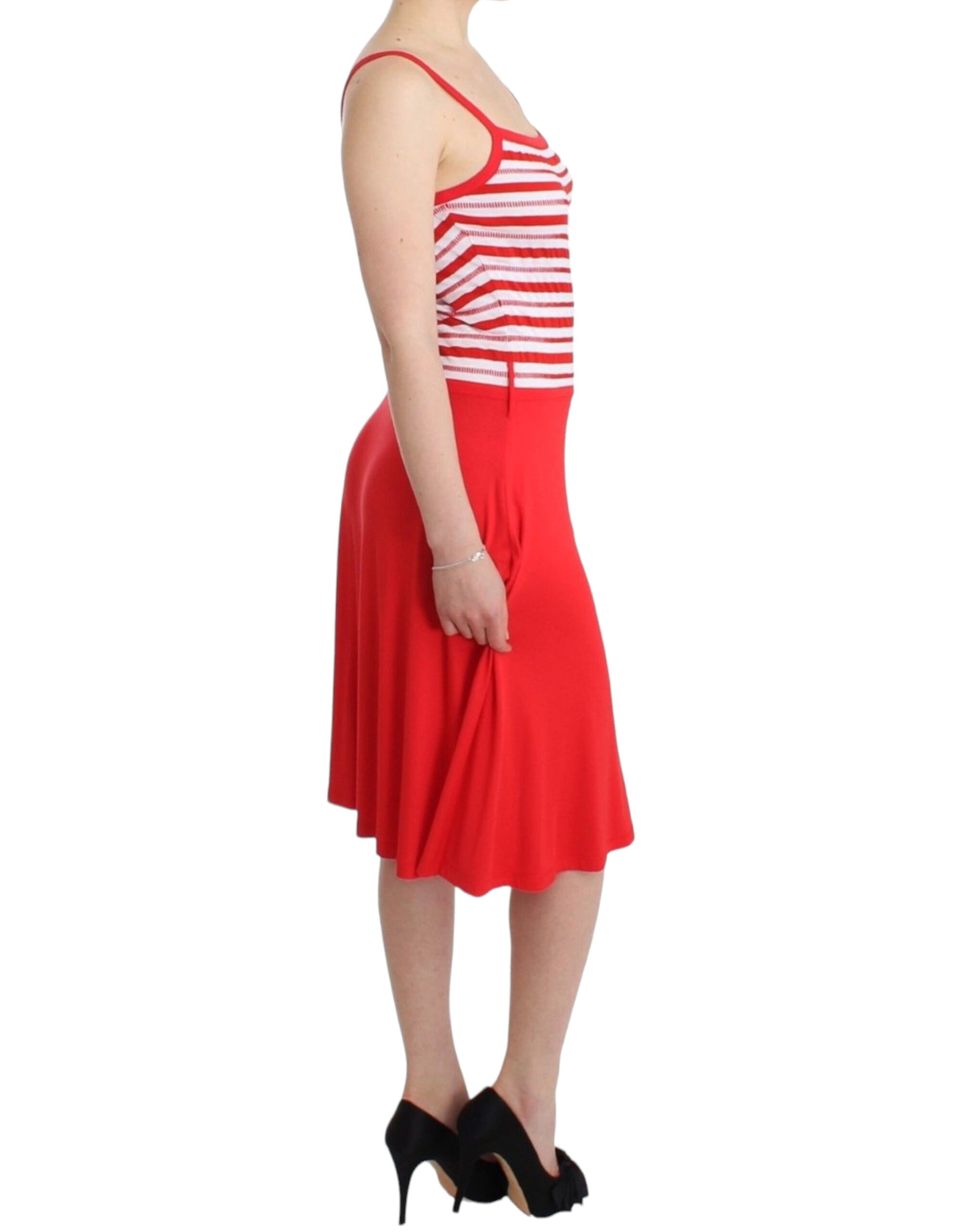 Woman wearing red skirt and white top