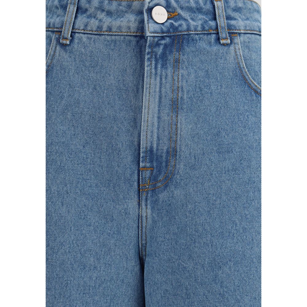 Blue denim jeans on a hanger
