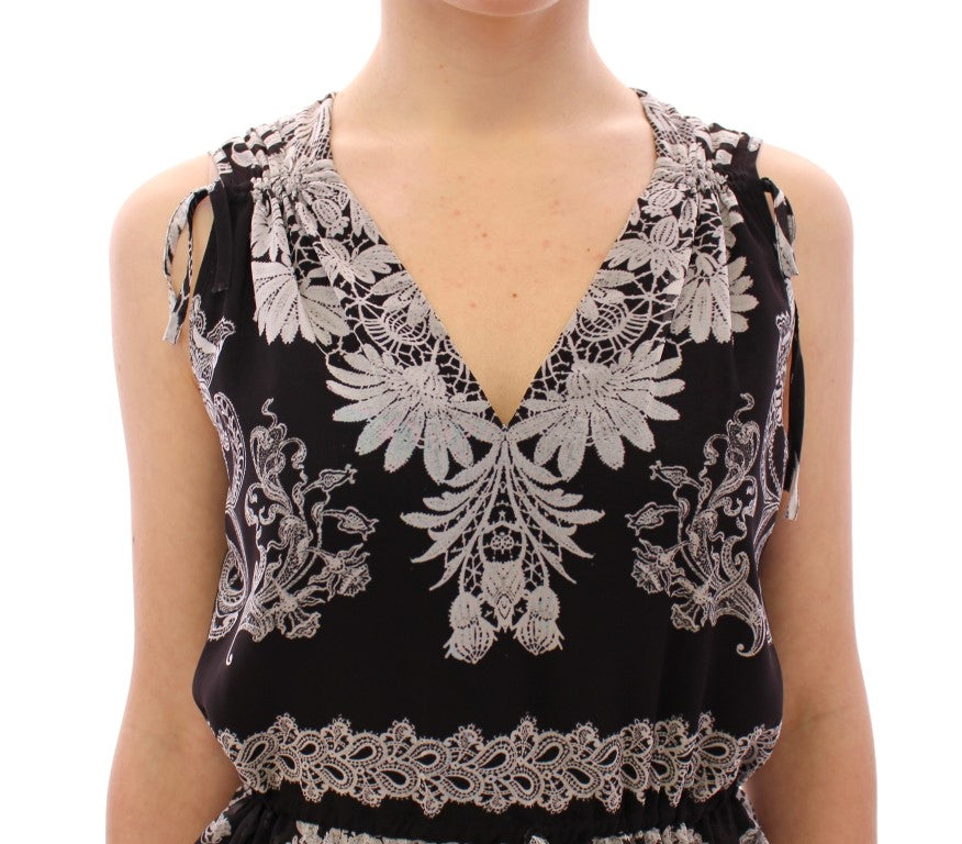 Black tank top with floral embroidery on shoulders