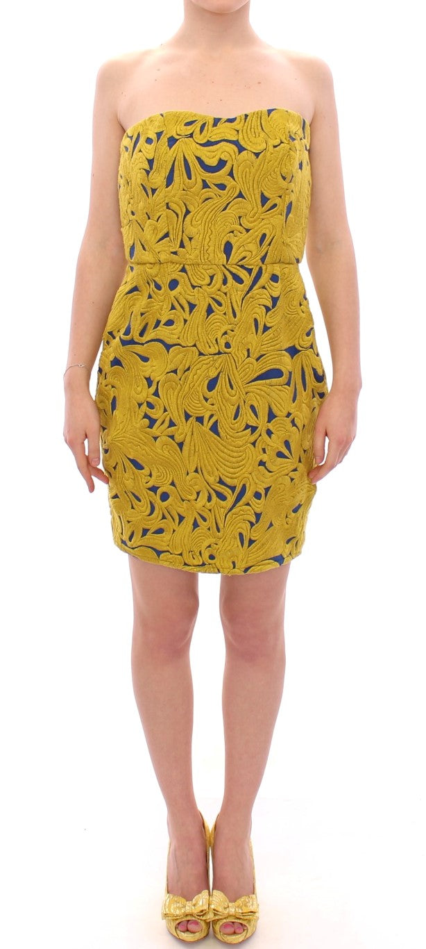 Yellow dress with blue pattern on woman