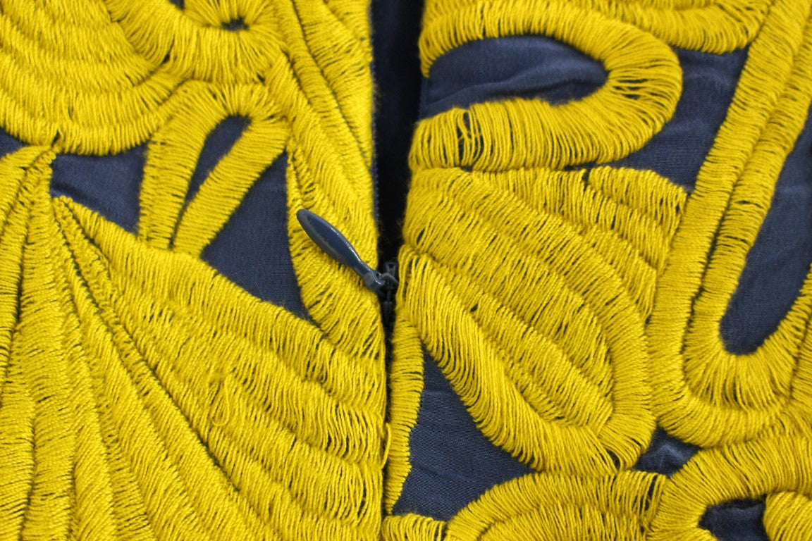 Yellow embroidered fabric on jacket