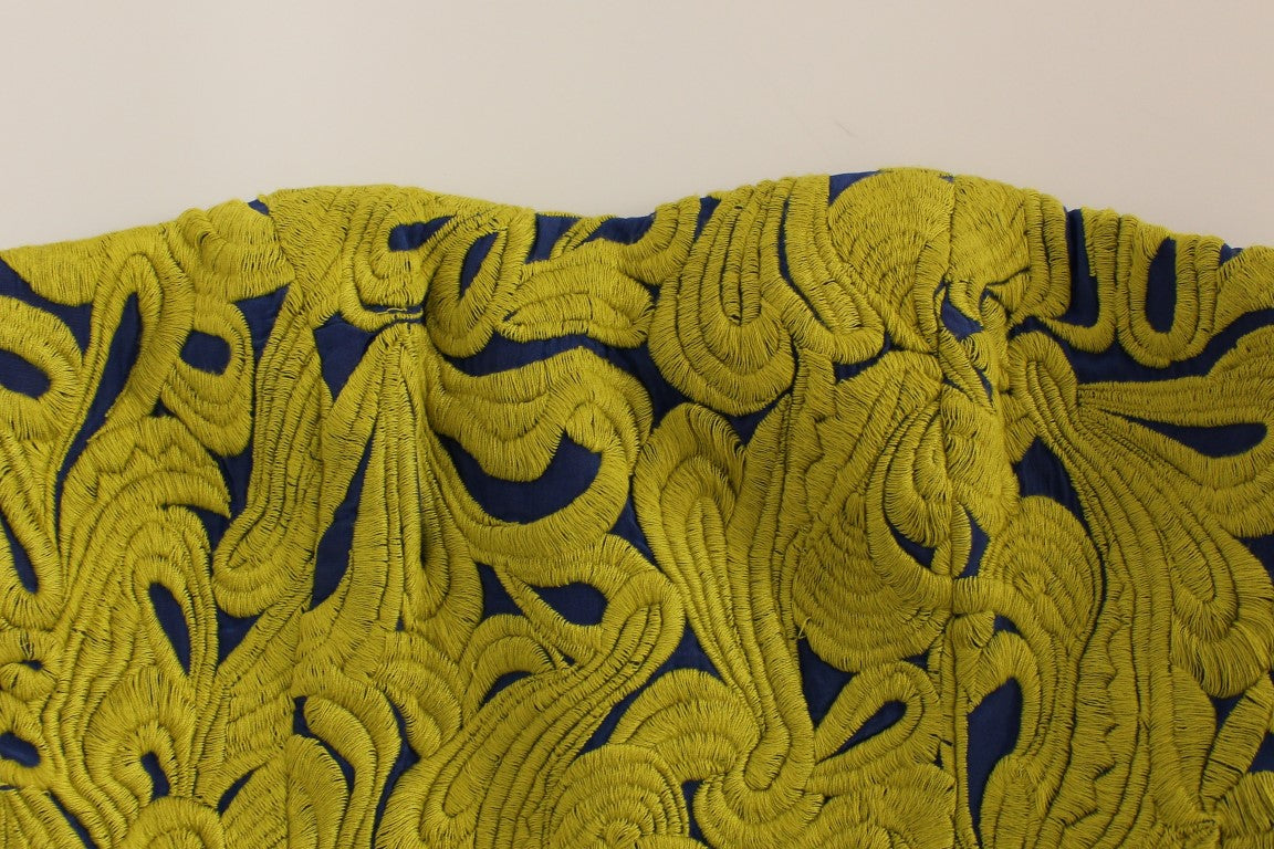 Yellow embroidered fabric with blue accents