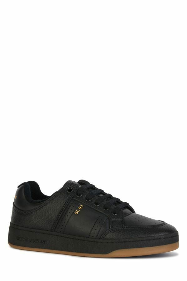 Black sneaker with white sole and laces