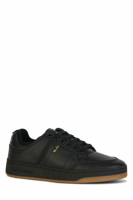 Black sneaker with white sole and laces