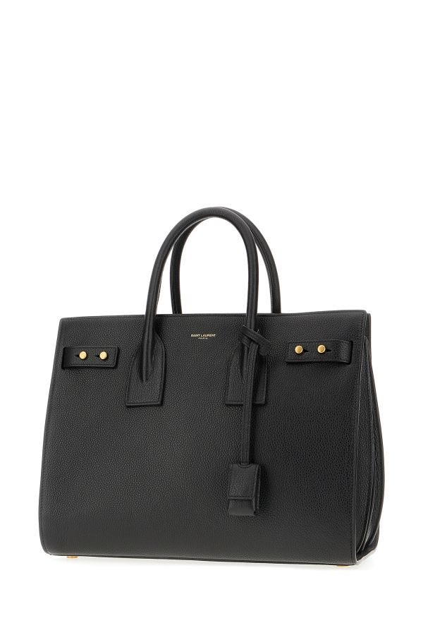 Black leather briefcase with gold accents