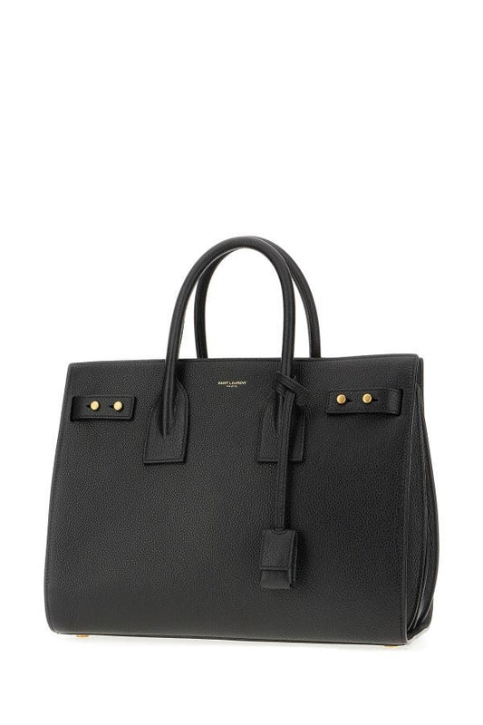 Black leather briefcase with gold accents