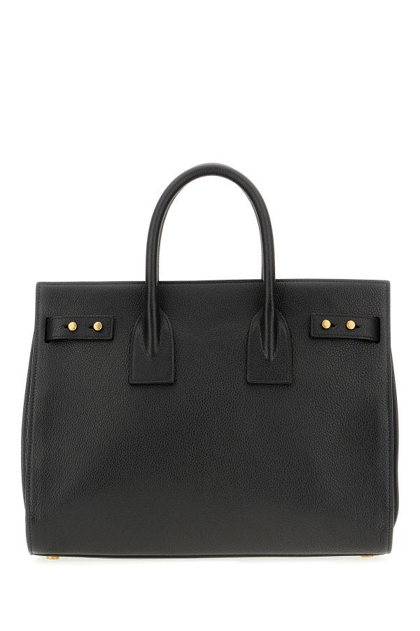 Black leather briefcase with gold accents
