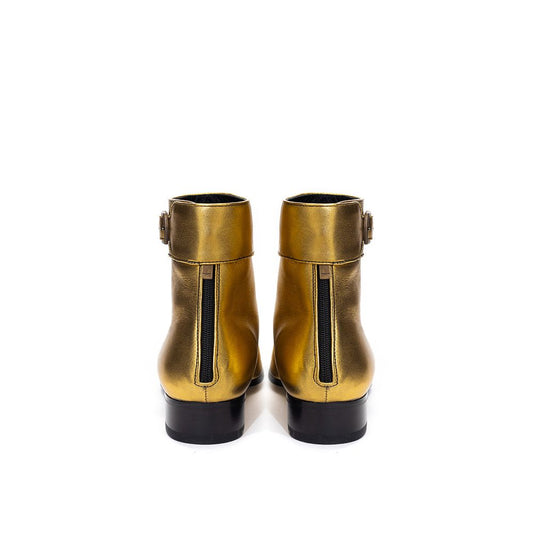Gold boots on white background