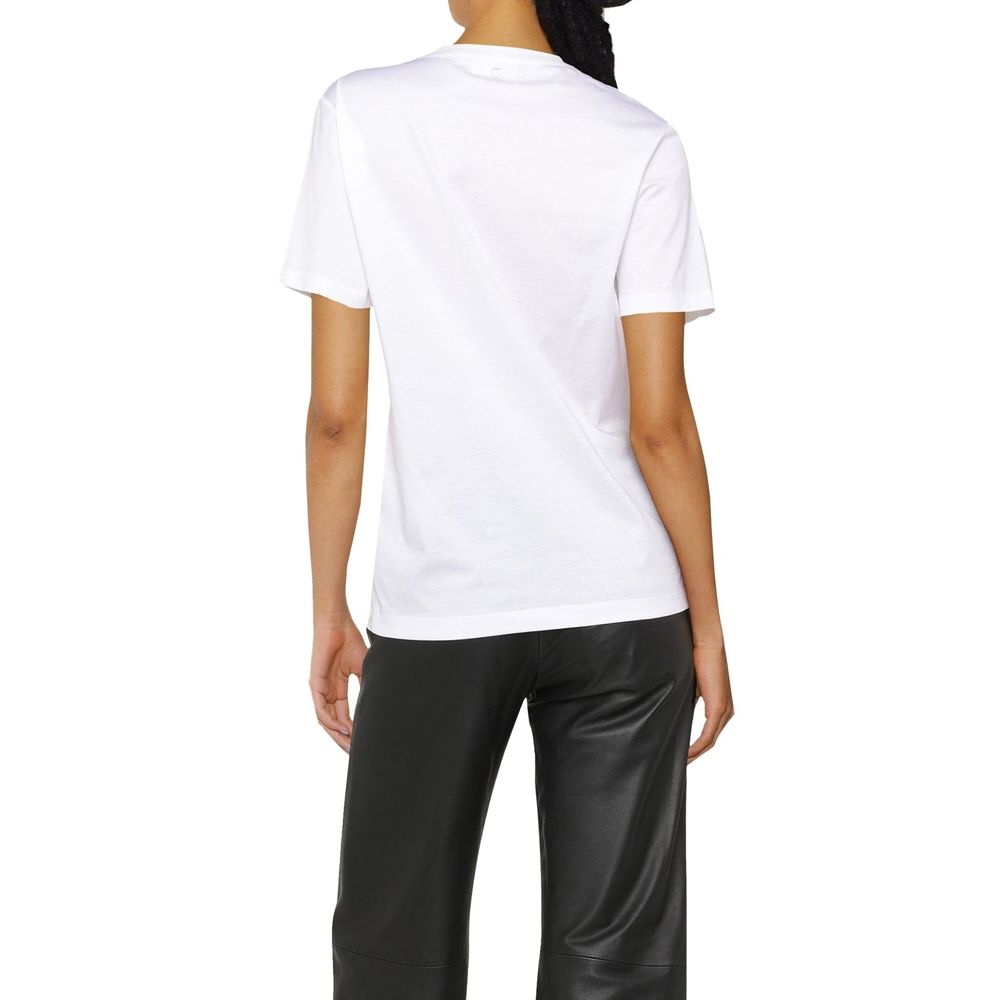 White t-shirt on a person wearing black pants