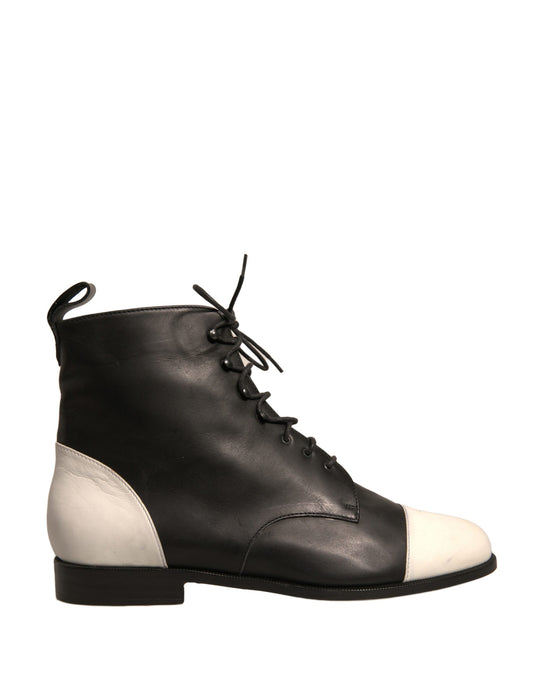 Black leather boot with white laces and trim