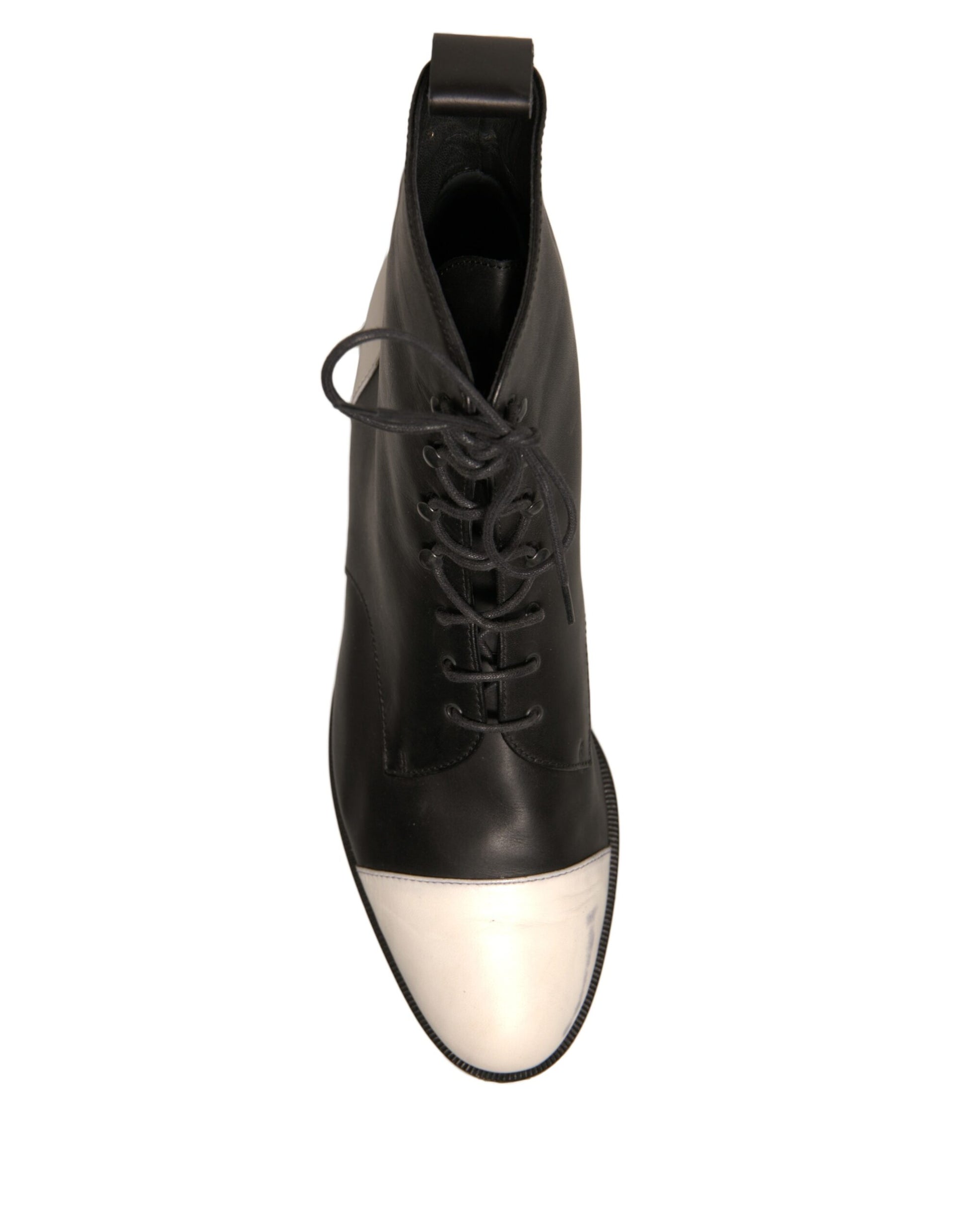 Black leather boot with white sole
