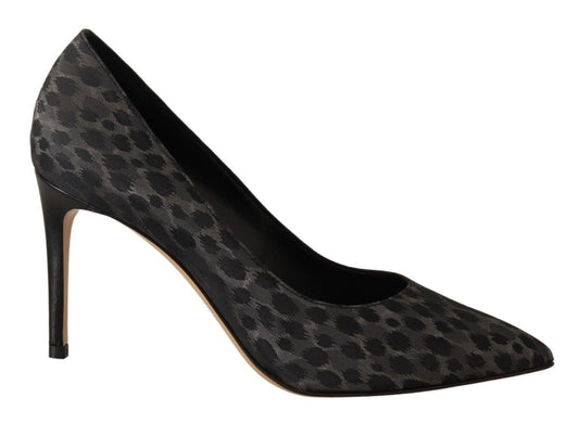 Black high heel shoe with patterned design on toe and heel