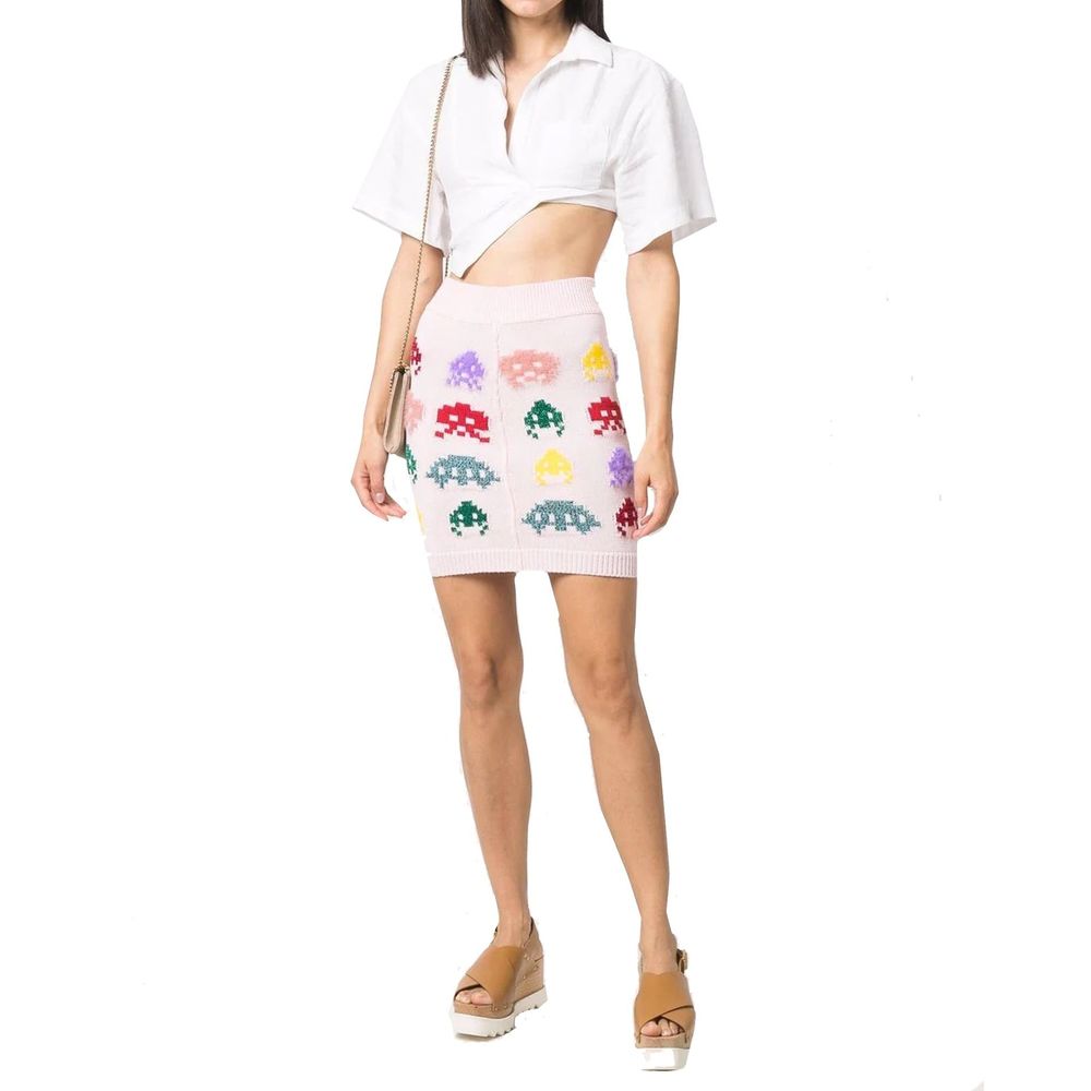 Woman wearing a colorful skirt with mushroom print