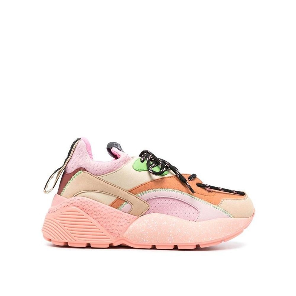 Pink sneaker with white laces