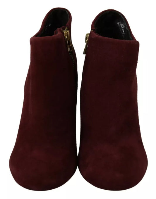 Pair of burgundy suede boots