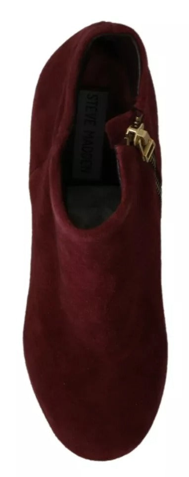 Red slipper with gold buckle
