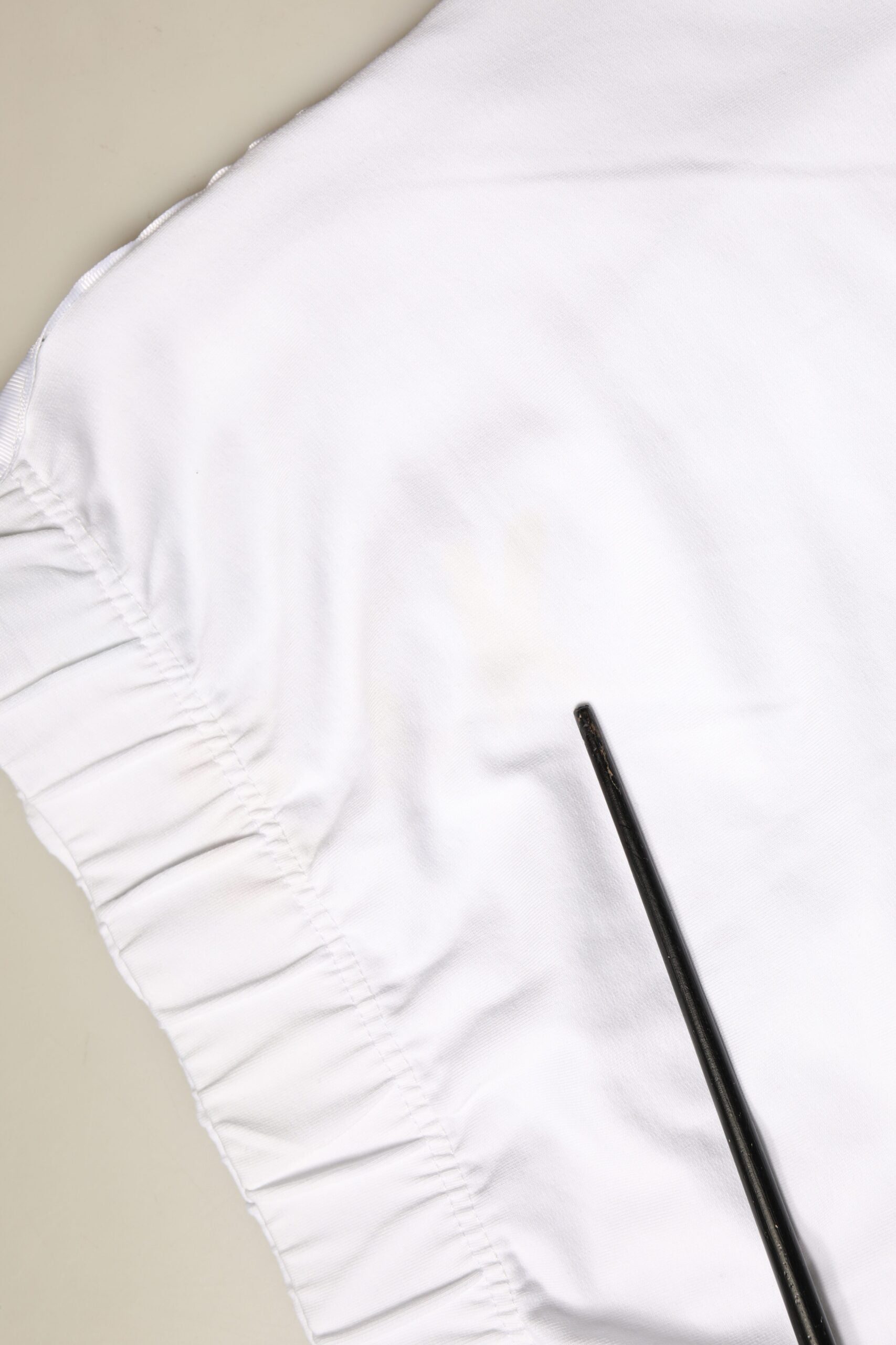 White cloth napkin with ruffled edges