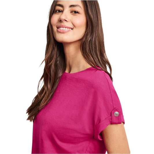 A woman wearing a pink cotton t-shirt with short sleeves