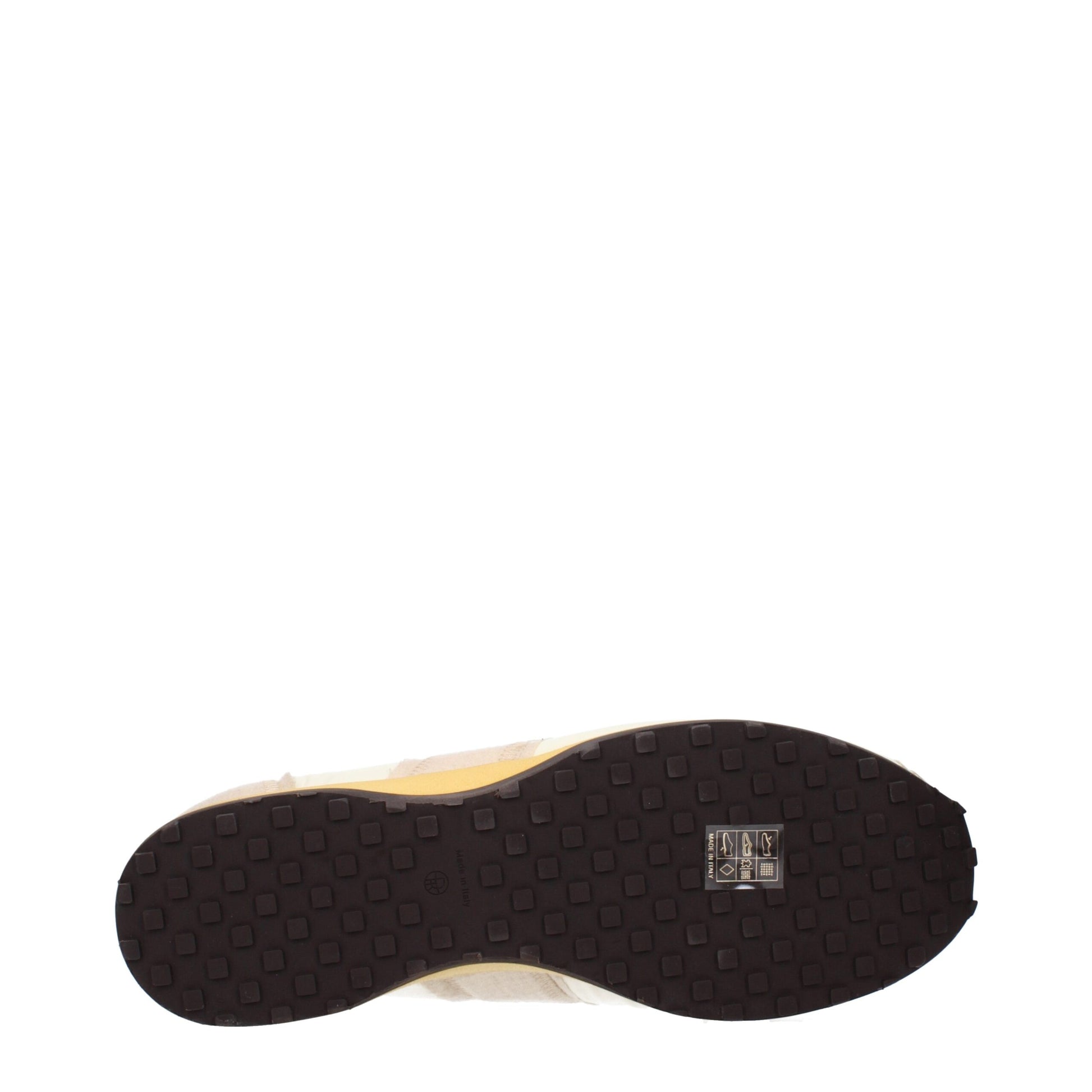 Black athletic sneaker with beige sole