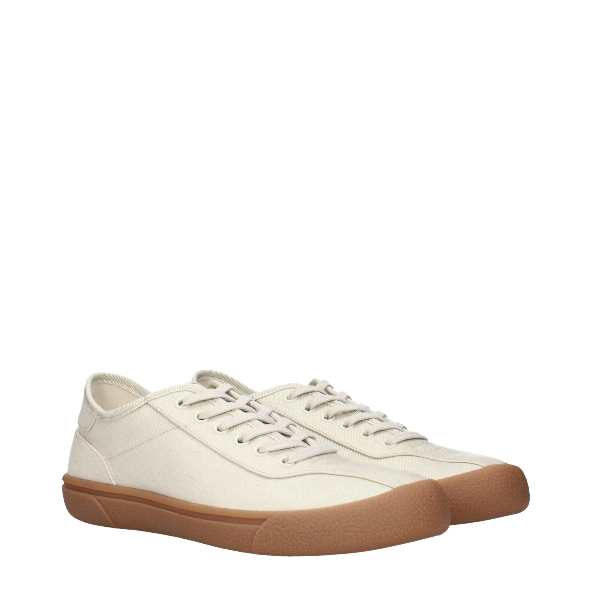A pair of beige fabric sneakers with white laces