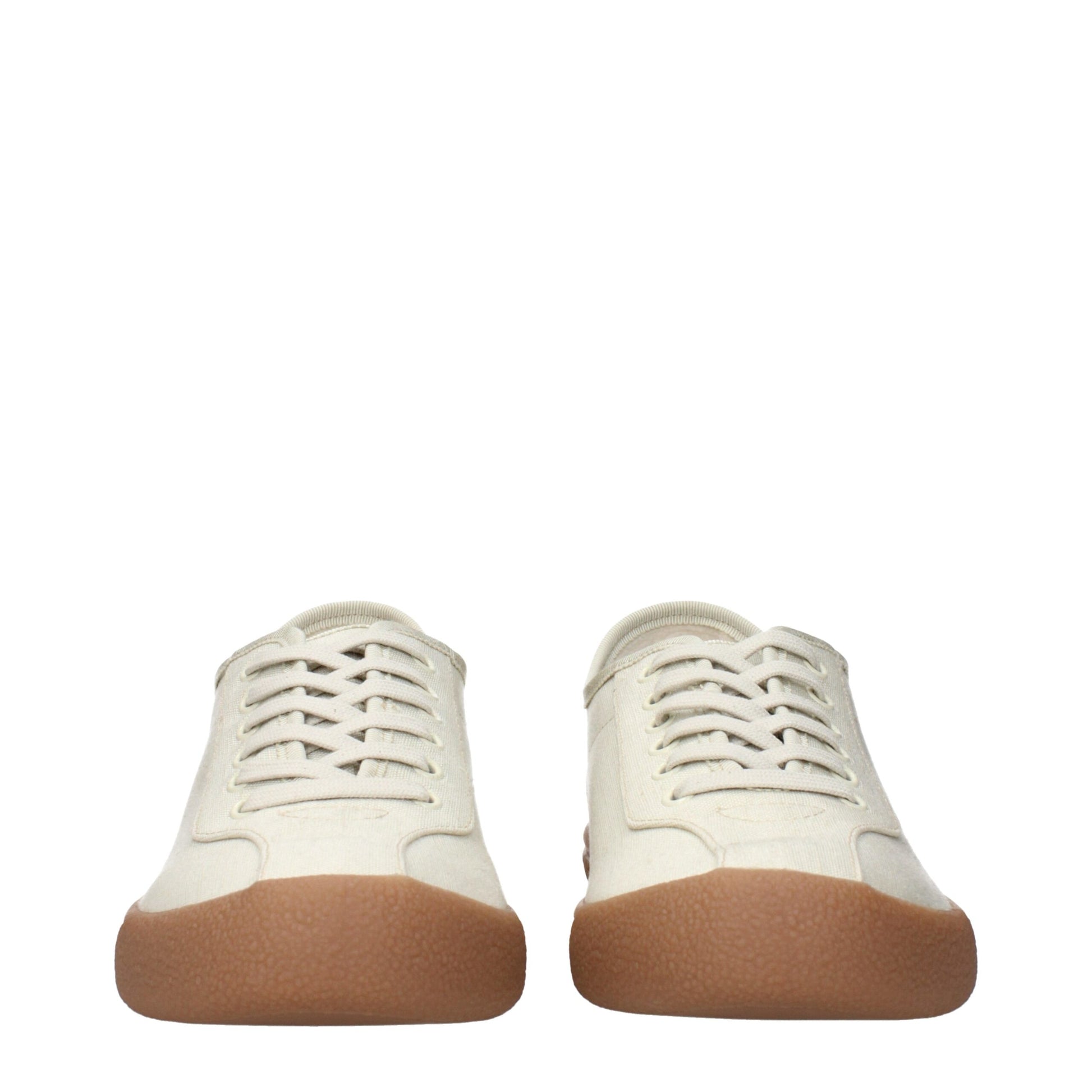 Pair of beige fabric sneakers with lace-up detailing