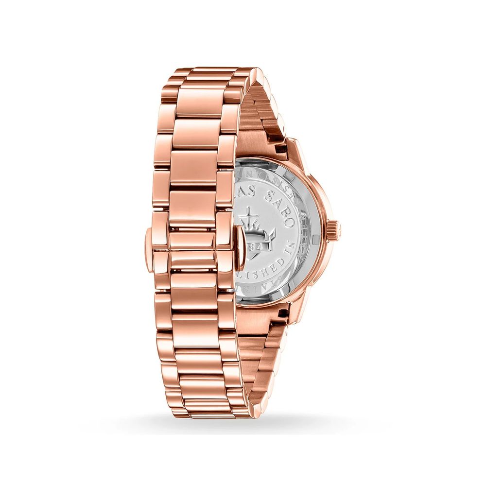 A rose gold watch with a white face, featuring a crown on the right side and a date window at 6 o'clock