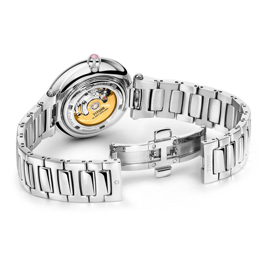 Silver watch with yellow face and pink accents
