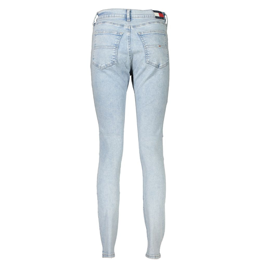 Pair of light blue denim jeans with visible stitching and a small red logo on the right leg