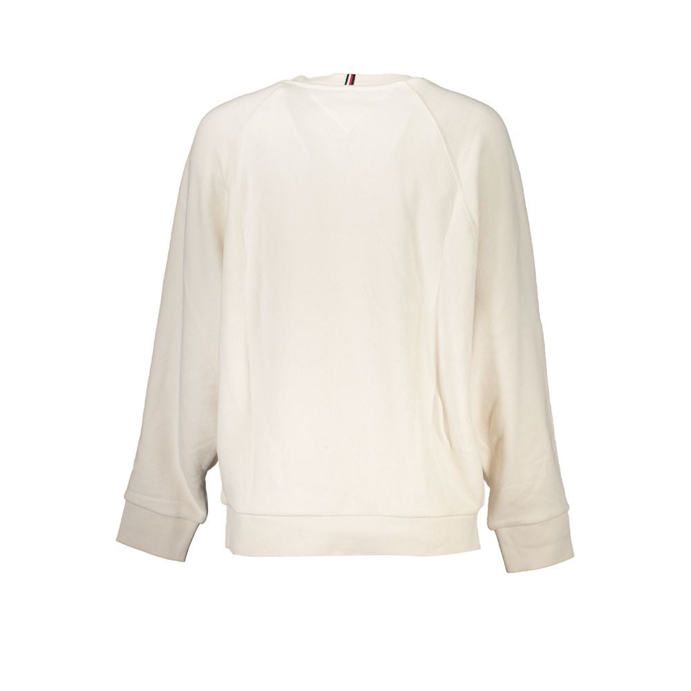 Tan sweatshirt with long sleeves and a crew neckline
