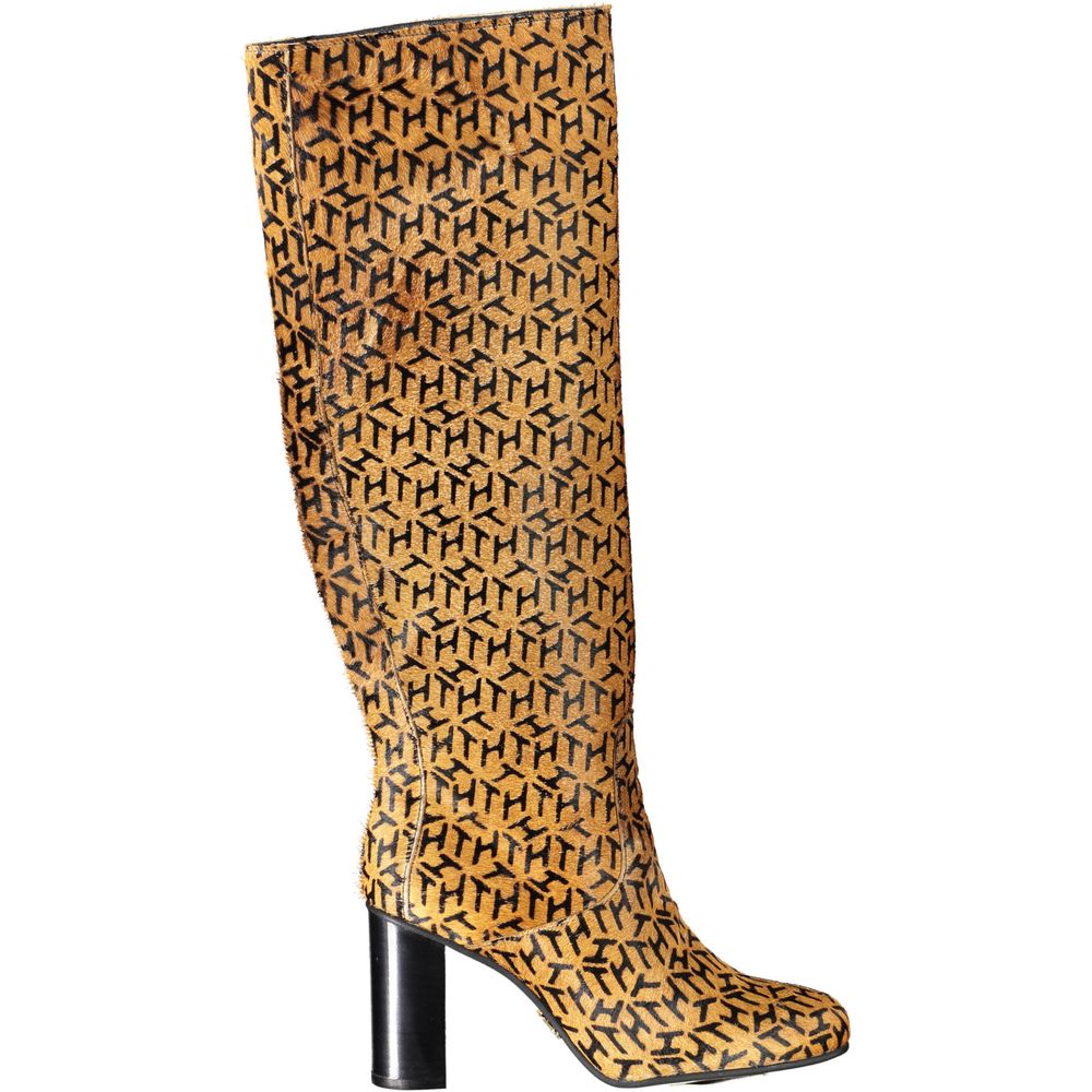 Tall brown boot with patterned design on side
