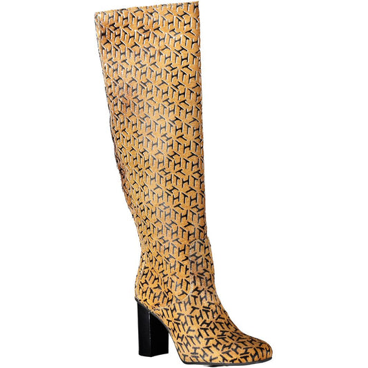 Tall yellow boot with animal print pattern and black heel