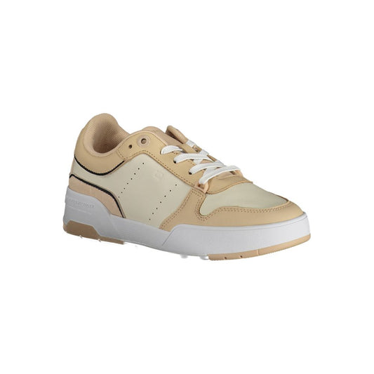 Tan sneakers with white sole