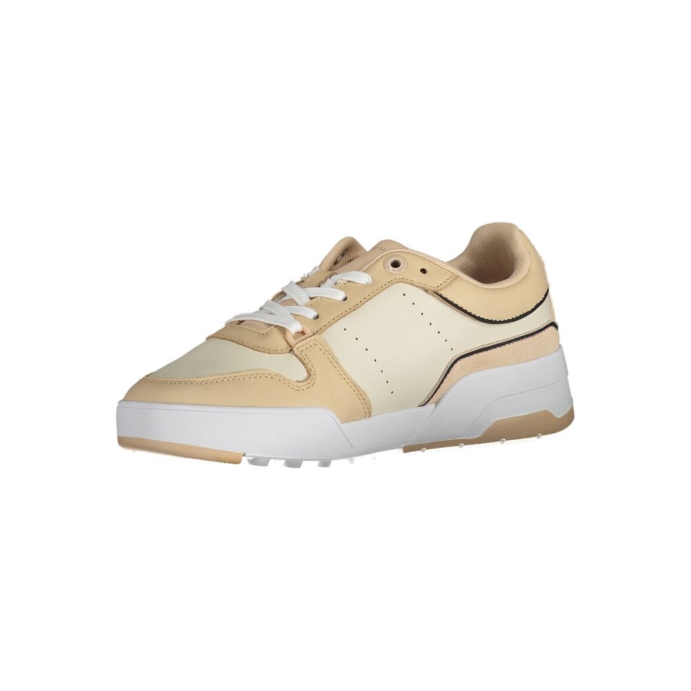 Tan sneaker with white sole and laces