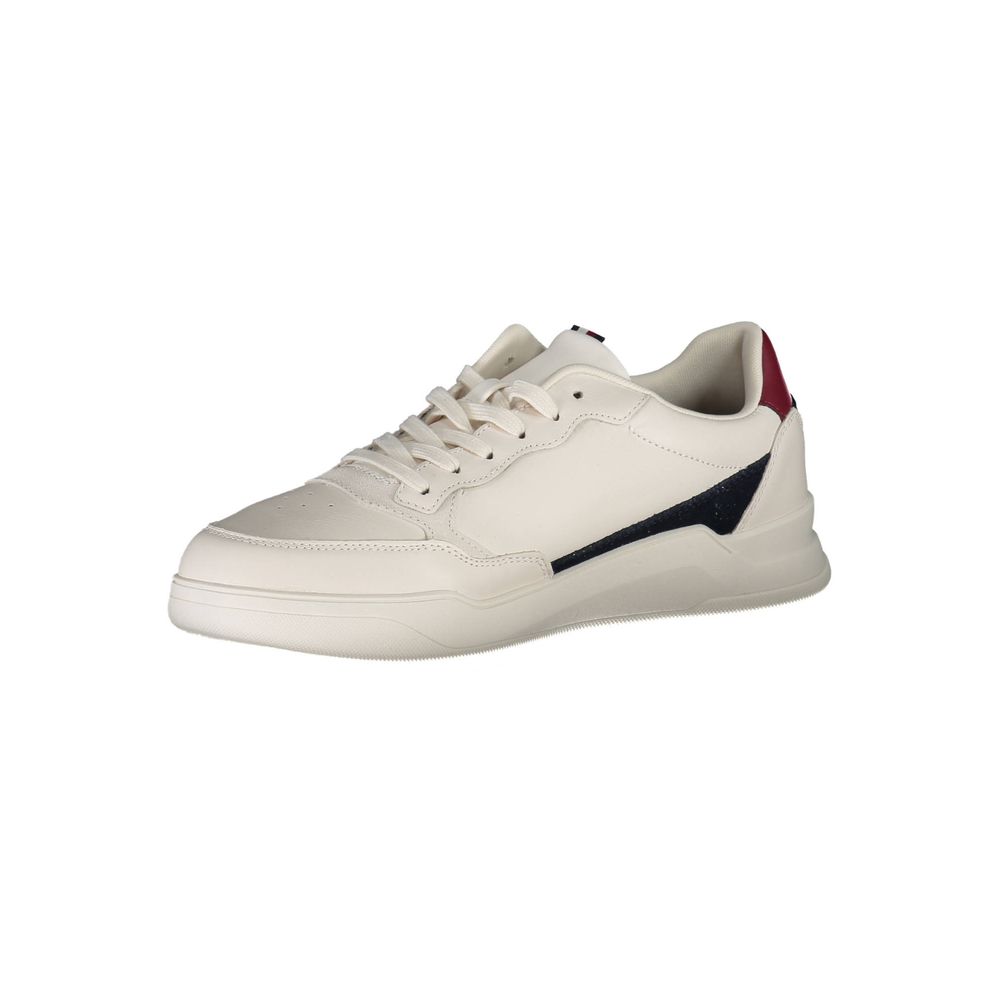 White sneaker with red and blue accents on side