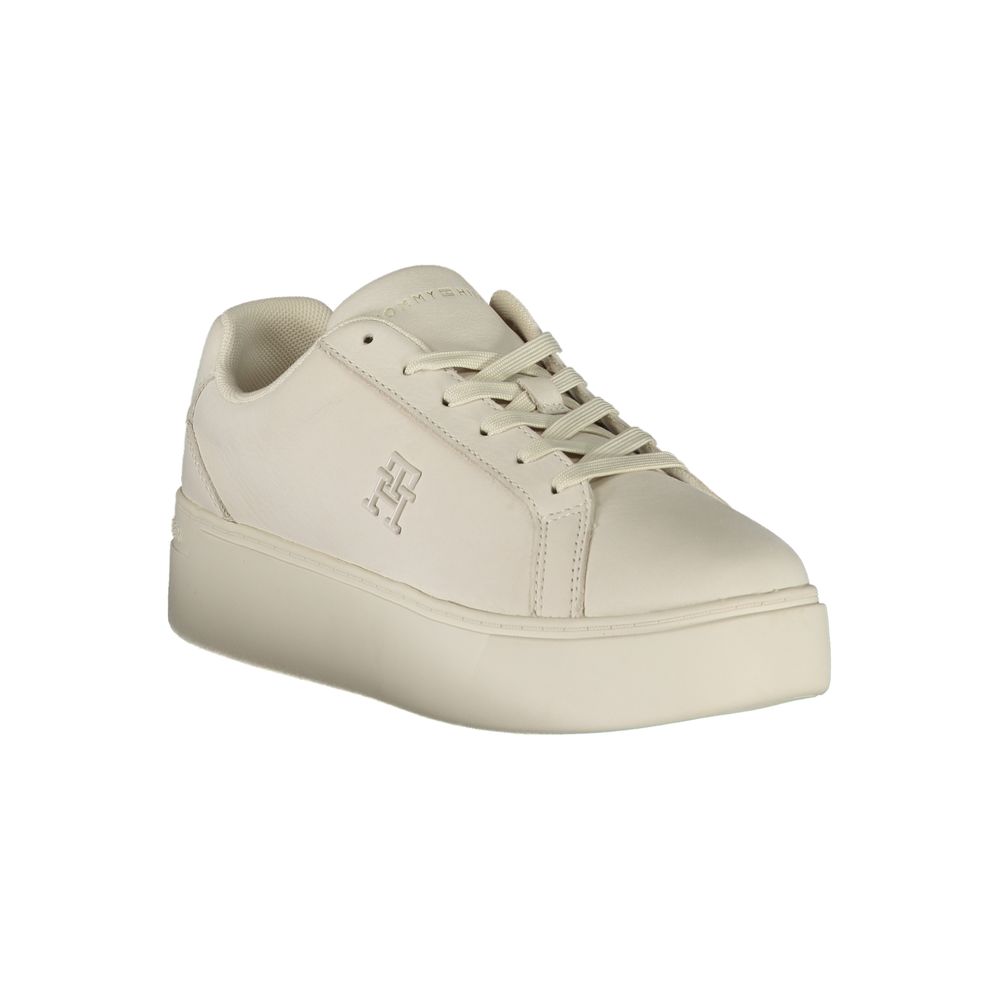 Tan sneaker with white sole and laces