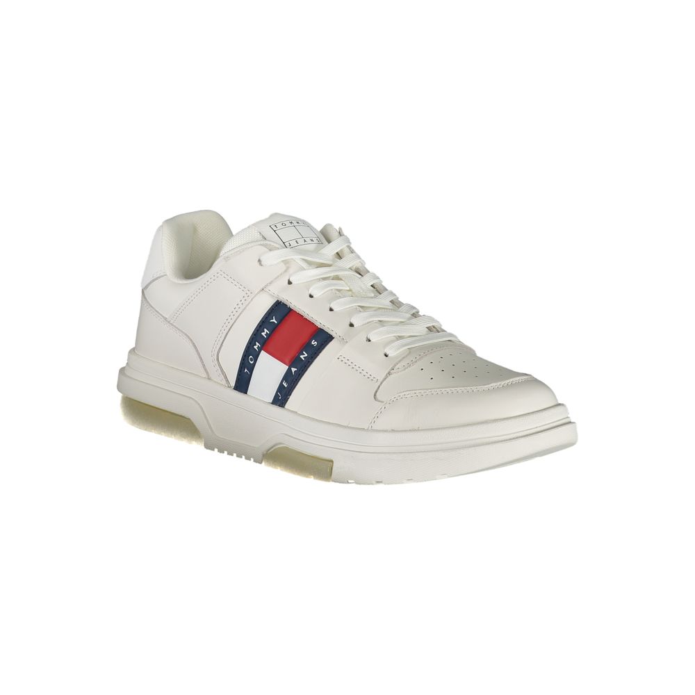 White sneaker with red stripes and gold accents