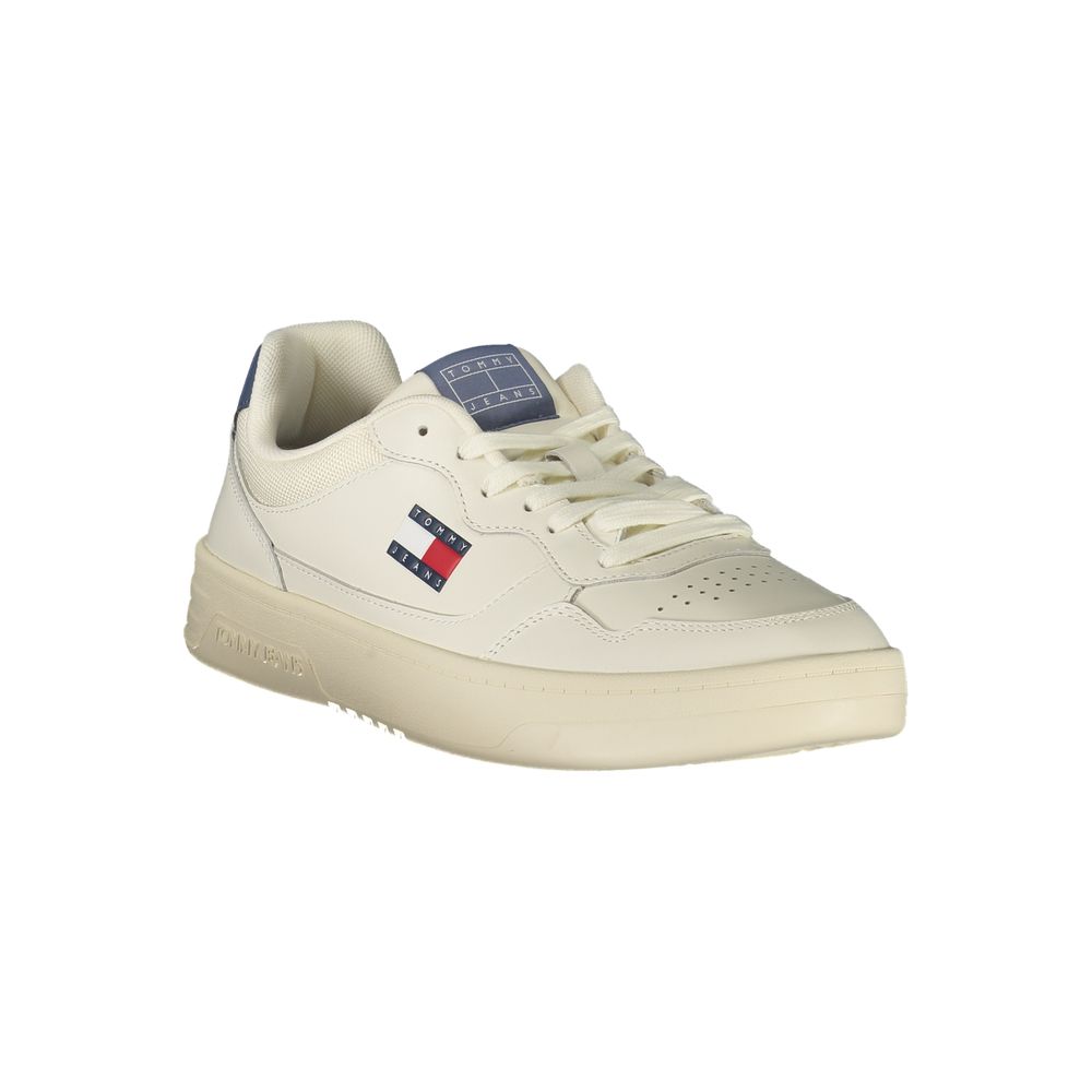 A white men's sneaker with a blue logo on the side and a white lace-up front
