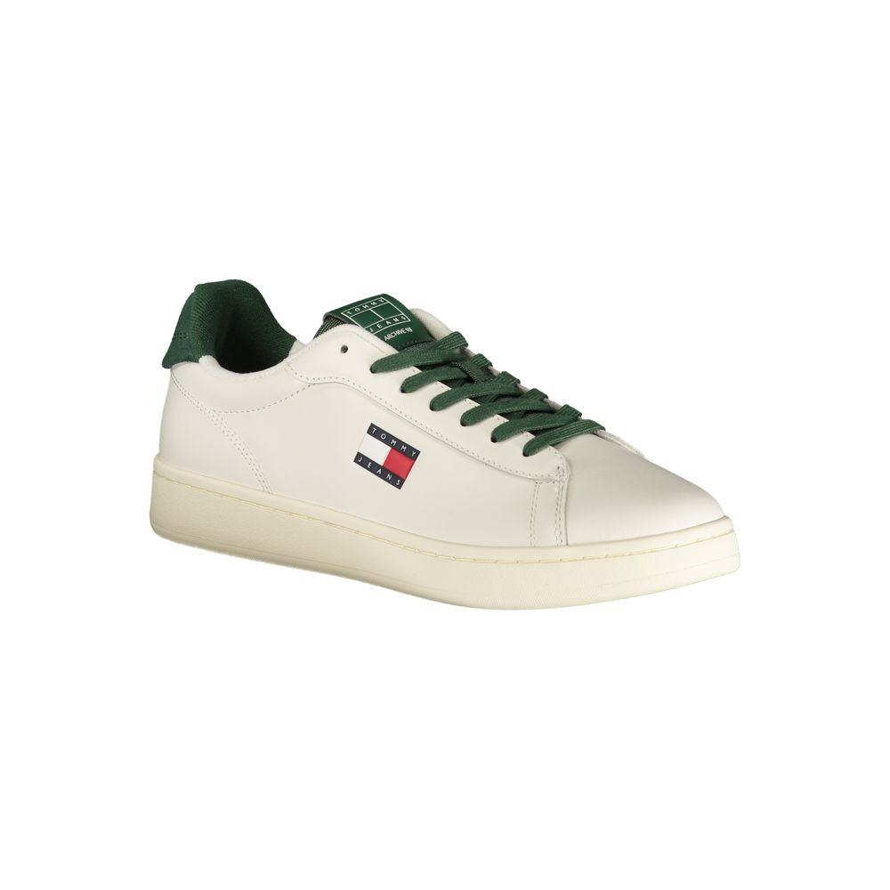 White sneaker with green laces, logo on side, polyurethane sole