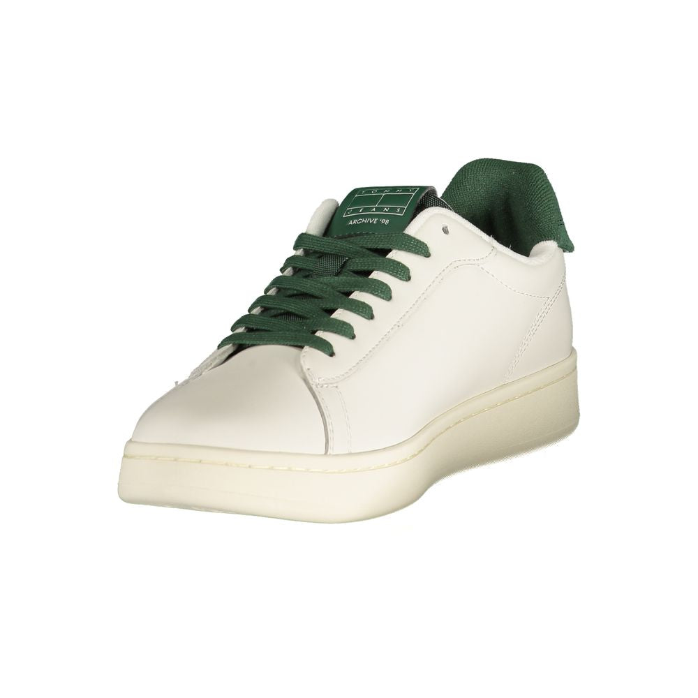White men's sneaker with green laces, polyurethane sole, and logo on side