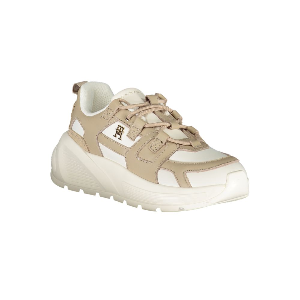Tan sneaker with white sole and laces