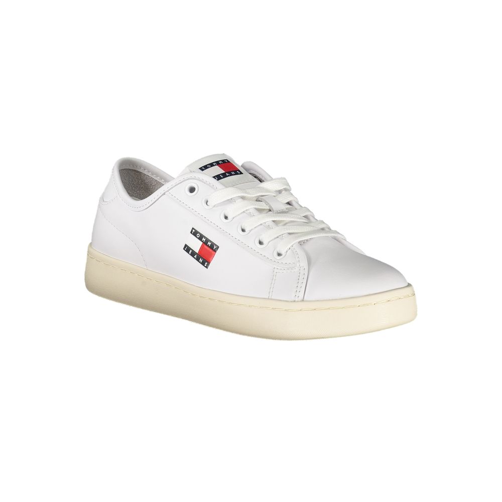 White sneaker with red logo on side, laces, and sole