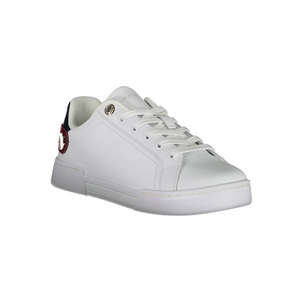 White sneaker with red logo on side, laces, and sole